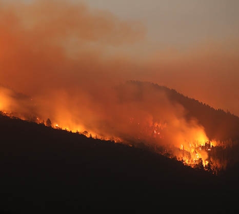 Burning trees from wildfires and smoke cover the landscape in California, U.S. Photographer: David Swanson/Bloomberg